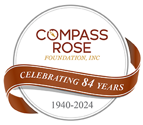 Compass Rose 84 Years Logo